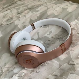 Rose gold Beats headphones